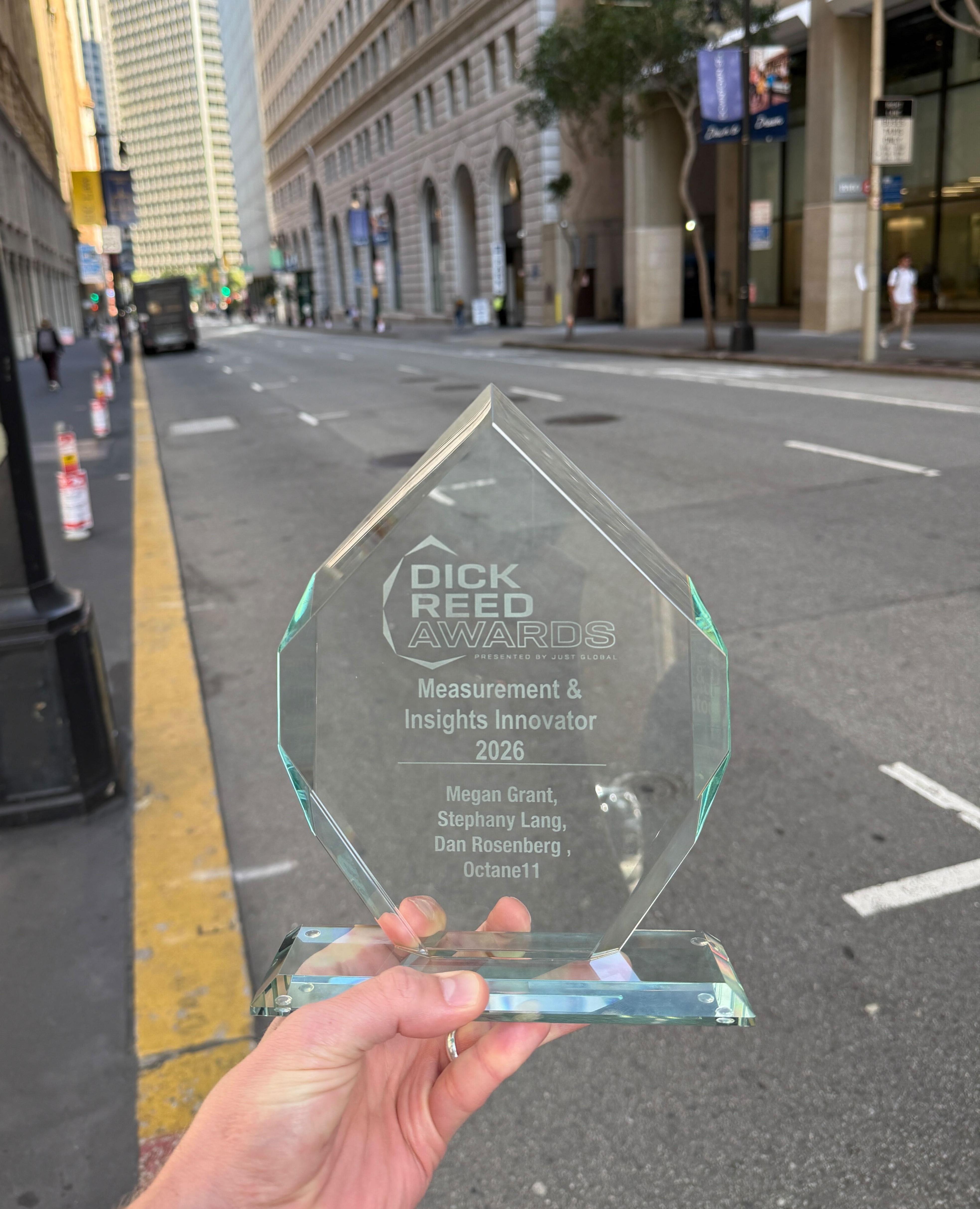 The 2026 Dick Reed Awards Measurement & Insights Innovator trophy on a San Francisco street